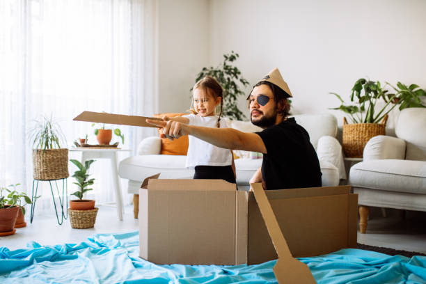 istock Father Playing Exciting Adventure Game With Daughter 1300902443