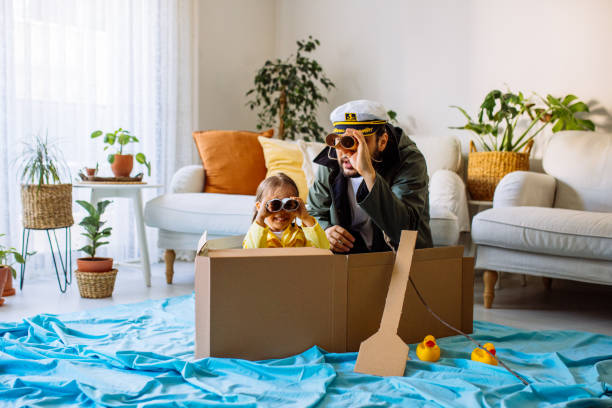 istock Father Playing Exciting Adventure Game With daughter 1300904144