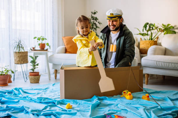istock Father Playing Exciting Adventure Game With daughter 1300904191