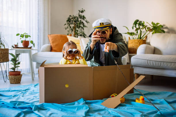 istock Father Playing Exciting Adventure Game With daughter 1300904921