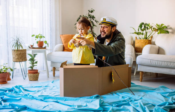 istock Father Playing Exciting Adventure Game With daughter 1300905016