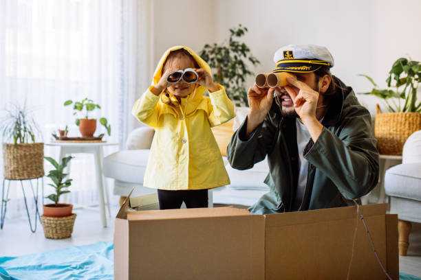 istock Father Playing Exciting Adventure Game With daughter 1300905097
