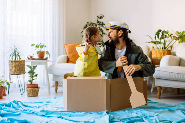 istock Father Playing Exciting Adventure Game With daughter 1300905145