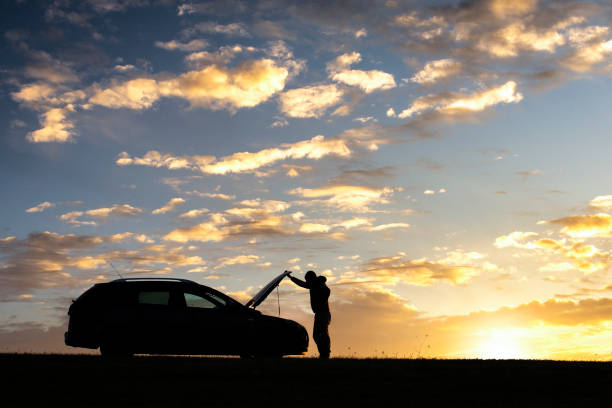 istock Unrecognizable Man Having Car Trouble At Sunset 1300906203