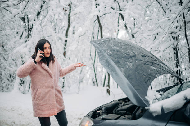 istock Woman Calling for help, her car broke! 1300906212