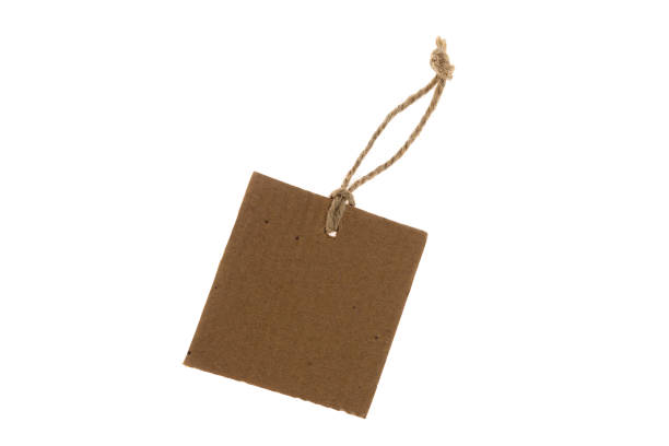 istock Blank and empty cardboard price tag tied with string isolated on white background with clipping path 1300913593