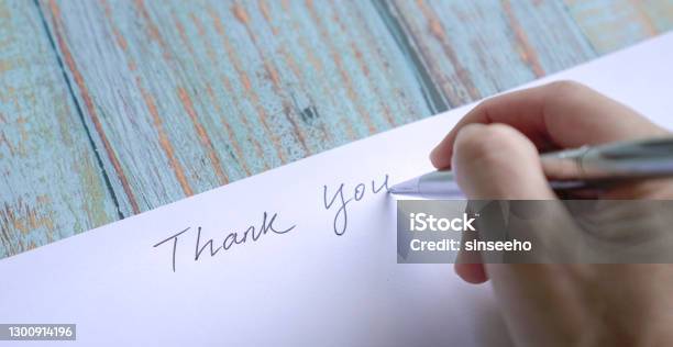 Woman Writing Thank You On Card Or Paper Close Up View Stock Photo - Download Image Now