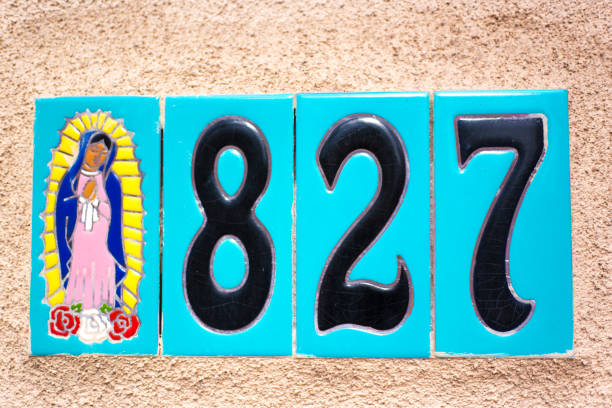 Turquoise Ceramic Number 827 Street Address Tiles Turquoise Ceramic Number 827 Street Address Tiles; Mexican tile on adobe wall. Shot in Santa Fe, NM. ceramic tile house numbers stock pictures, royalty-free photos & images