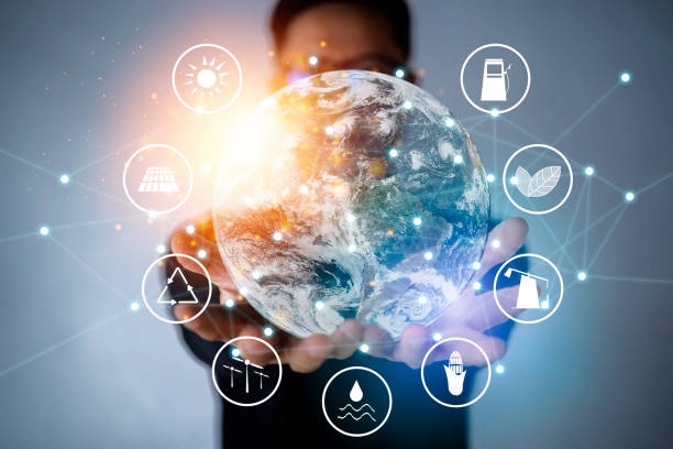istock Hand holding light bulb against nature on green leaf with icons energy sources for renewable, sustainable development. Ecology concept. Elements of this image furnished by NASA. 1300920833