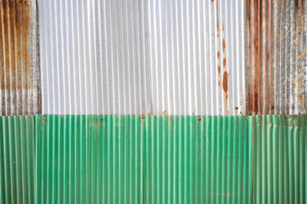 Old rusty zinc sheet wall, rusty zinc barn wall. Zinc wall pattern texture background