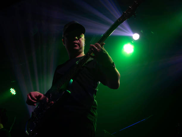 istock Musician plaing guitar in concert. 1300923492