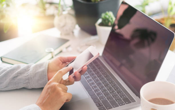 istock Woman hand using smartphone to do work business, social network, communication concept. 1300927881