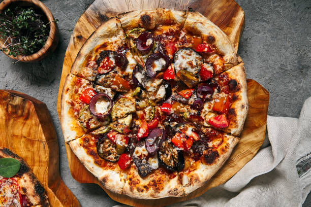istock BBQ Pizza with Onions and Seasons Vegetables 1300928100
