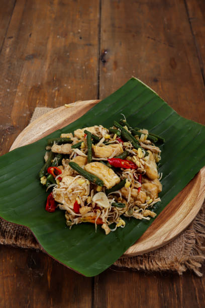 istock Stir fried cook of tofu and yard long bean 1300928105