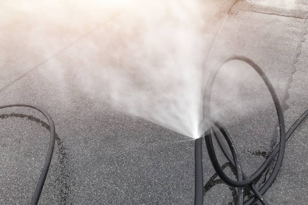 istock Punctured hose and high-pressure water leak 1300929581