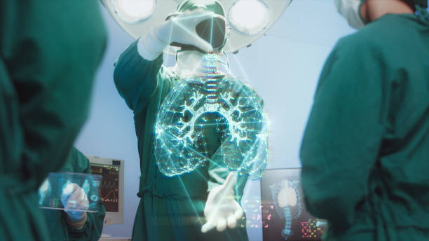 innowacja i technologia medyczna concept, zespół chirurgów wykorzystujący nowoczesny interfejs symulatora wirtualnej rzeczywistości hi-tech z hologramem diagnozuje układ oddechowy na sali operacyjnej - surgery emergency room hospital operating room zdjęcia i obrazy z banku zdjęć