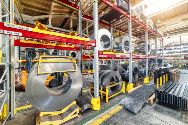 istock Factory stock wire. Wire spools lie on multi-tiered racks 1300937373