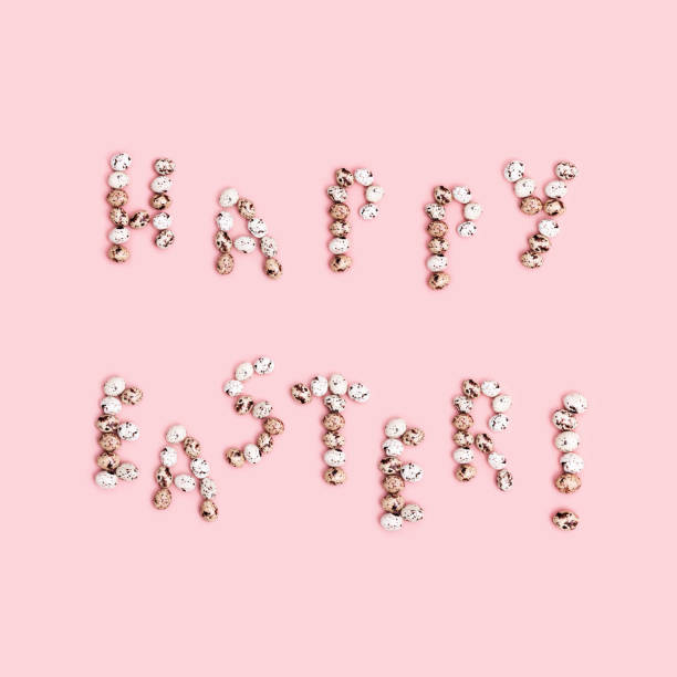 istock Words  Happy Easter from Chocolate Quail eggs on pastel background. Small pink egg, spring Easter holiday 1300938137