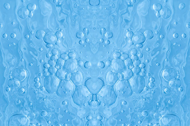 istock blue transparent clean drinking water abstract background. water surface with air bubbles background 1300938462