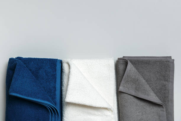 istock Three towel blue, white and gray colors. Top view flat lay copy space 1300939405