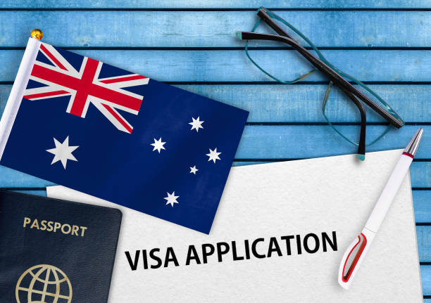 Australia Visa application form Visa application form and flag of Australia embassy photos stock pictures, royalty-free photos & images
