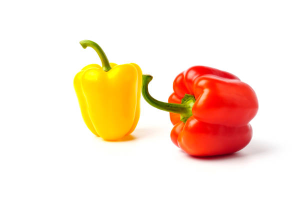 istock red bell pepper with yellow bell pepper isolated on white 1300941271