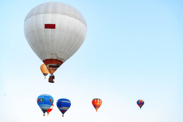 istock Hot air balloon flying in the sky 1300941358