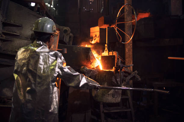 istock Working in foundry with hot liquid steel. 1300946975