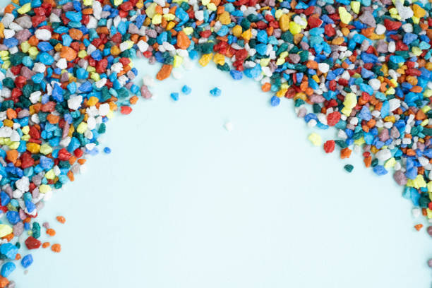 istock mock up background. empty space for your text. Colored stones. background small stones 1300948250