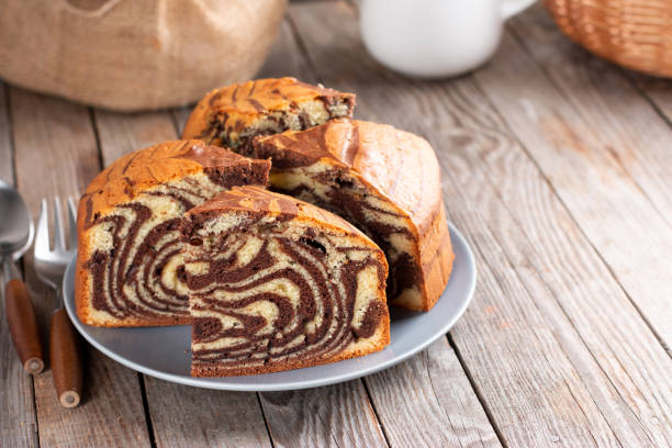 istock Homemade cake zebra with chocolate on rustic wooden table. Place for text 1300949241