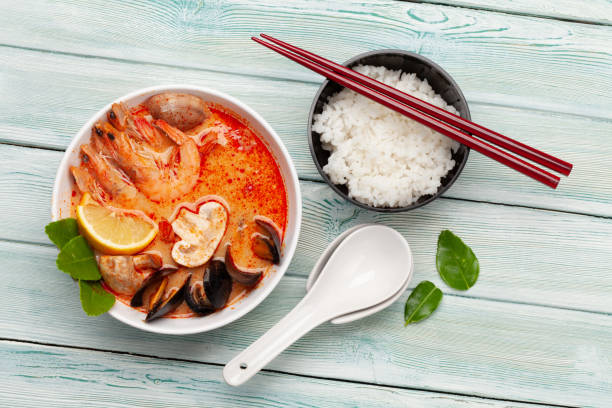 istock Traditional Thai soup Tom Yum and rice bowl 1300949558