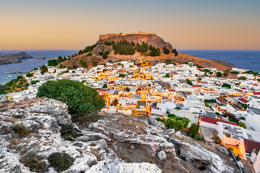Lindos small whitewashed village and the Acropolis, Rhodes, Greece.