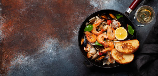 istock Mixed grilled seafood and white wine 1300951690