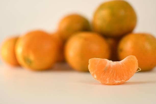 istock close up fresh sweet orange pulp on white background 1300952670