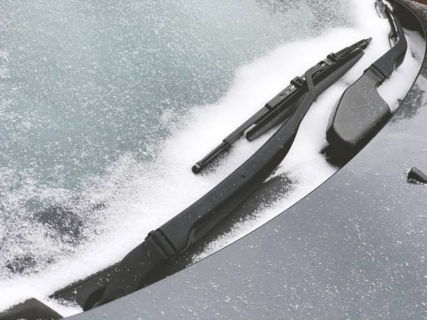 istock Light Snow On Frozen Car Windscreen 1300956019