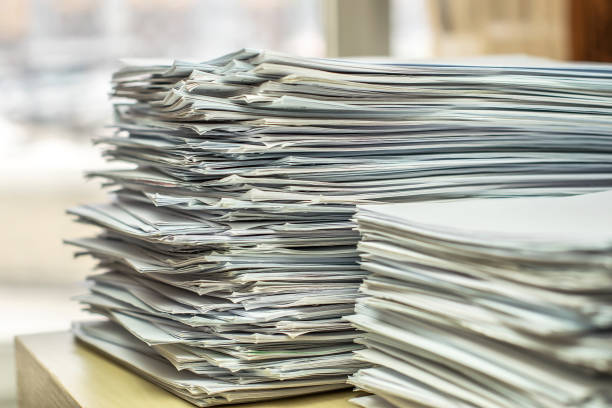 istock pile of paper documents in the office 1300959091