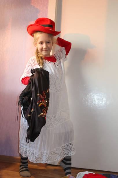 istock Pretty little girl in summer hat 1300959318