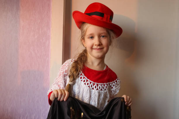 istock Pretty little girl in summer hat 1300959320