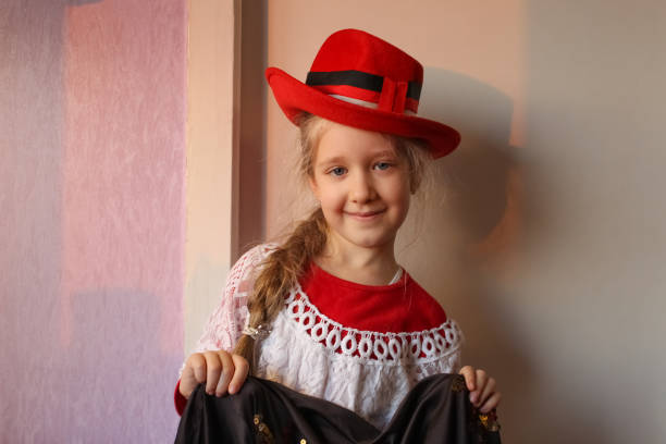istock Pretty little girl in summer hat 1300959332