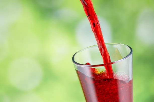 istock juice pouring into glass 1300959591