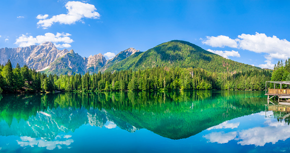 Fusine Lakes, two small lakes of glacial origin connected to each other by paths and located at the base of the Mangart mountain range (5 shots stitched)