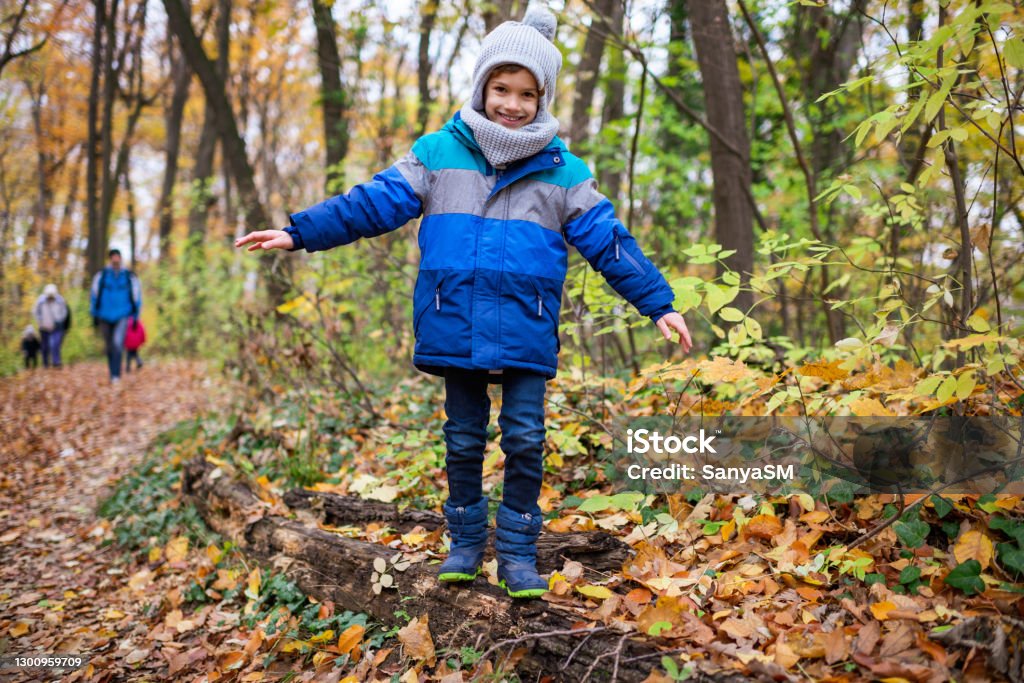 Beautiful boy exploring nature Young boy exploring and relaxing in the nature. Balance Stock Photo