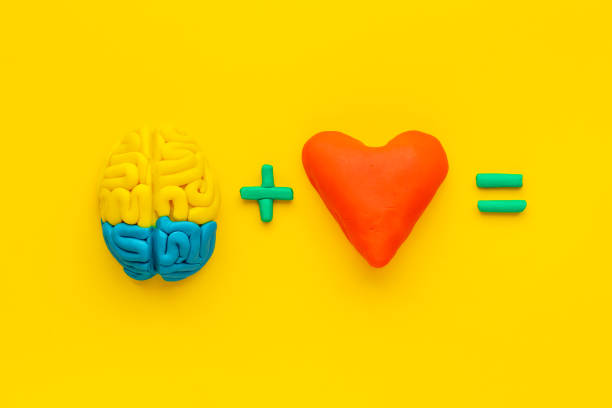 istock Think with love - heart and brain concept, top view 1300966002