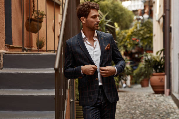 istock Young handsome man in classic suit 1300966124