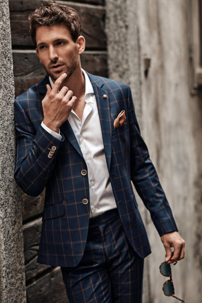 istock Young handsome man in classic suit 1300966245