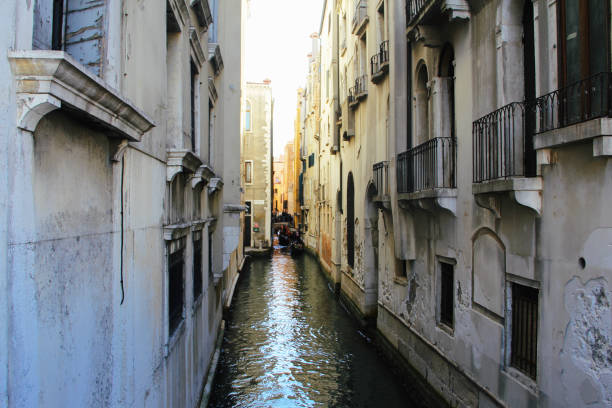 istock Venice canal view with palaces and water 1300966617