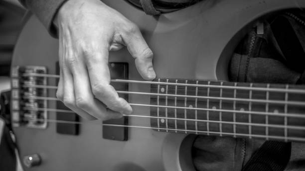 istock musician playing guitar, close up 1300967082