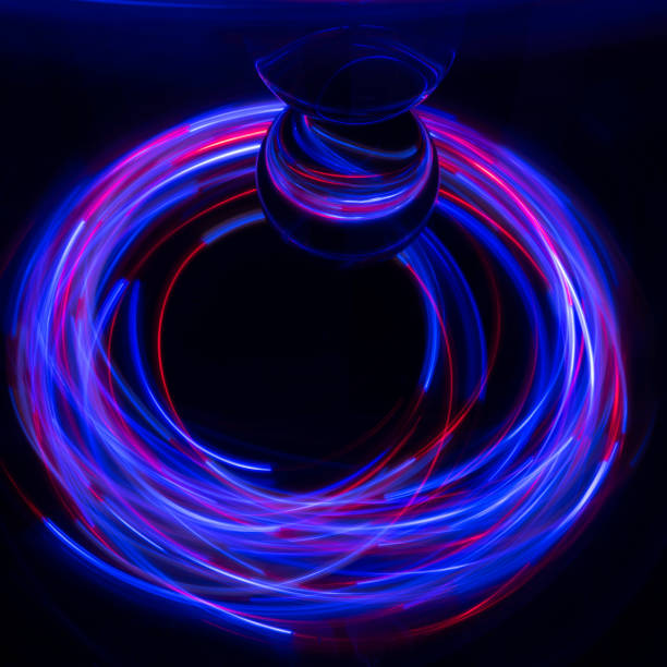 istock Lightpainting with small lights on a mirror 1300967843