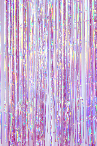 Silver foil tinsel strips. Festive decoration background