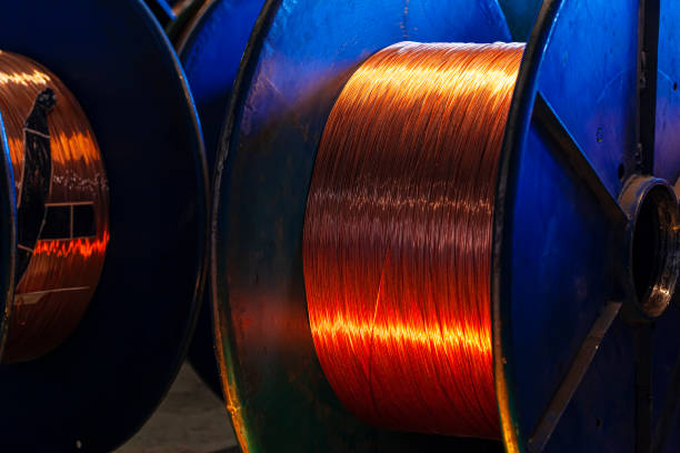 istock Copper wire reels in cable factory close up 1300969362